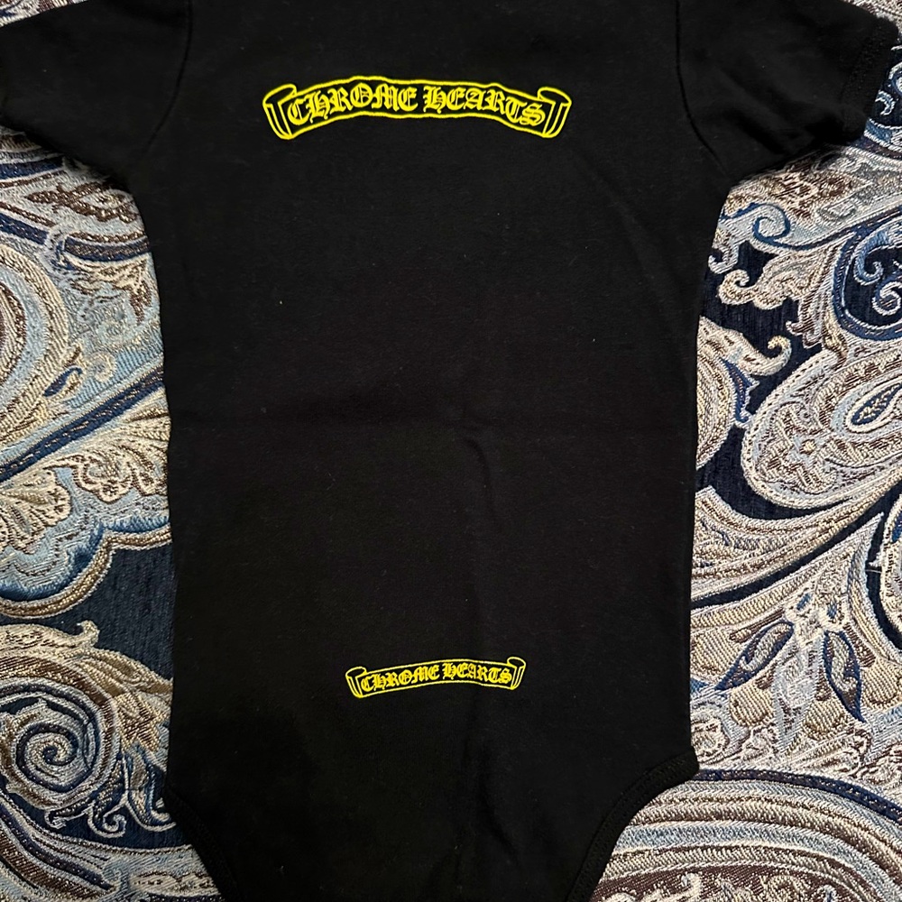Black and yellow chrome heart onesie